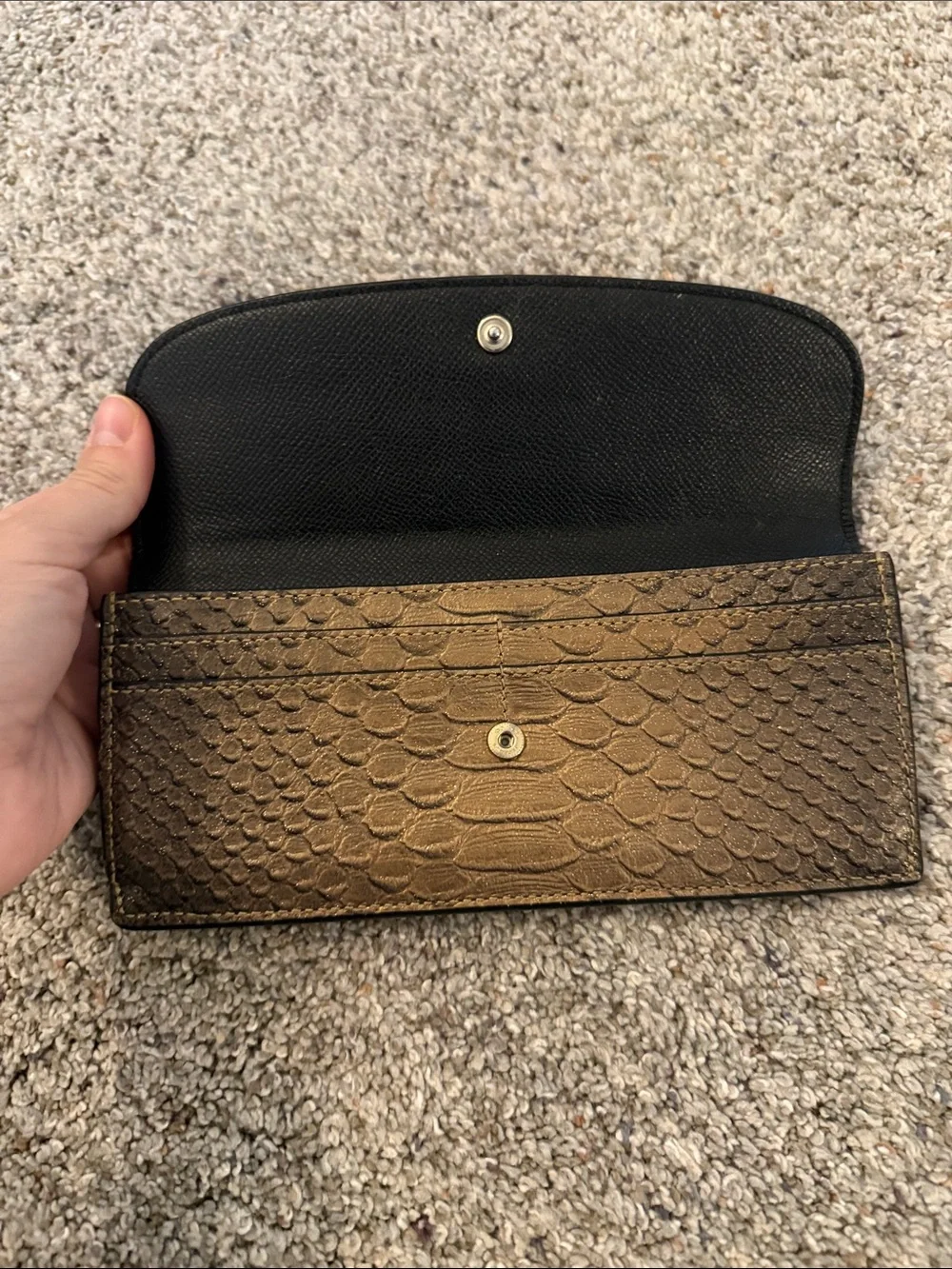 Coach Metallic snake-embossed leather envelope wallet in a muted gold tone